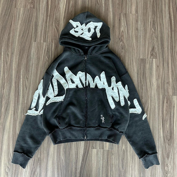 Stylish zippered hoodie with statement patches