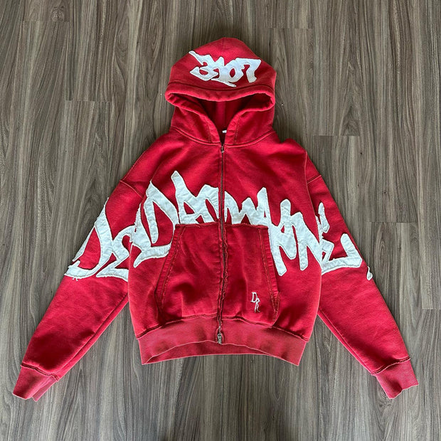 Stylish zippered hoodie with statement patches