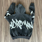 Stylish zippered hoodie with statement patches