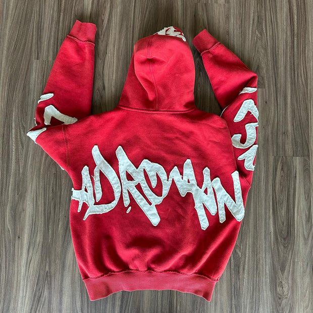 Stylish zippered hoodie with statement patches