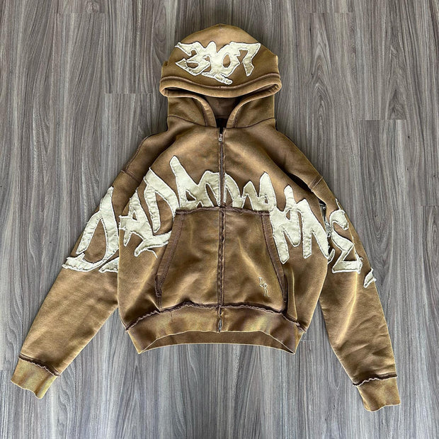 Stylish zippered hoodie with statement patches