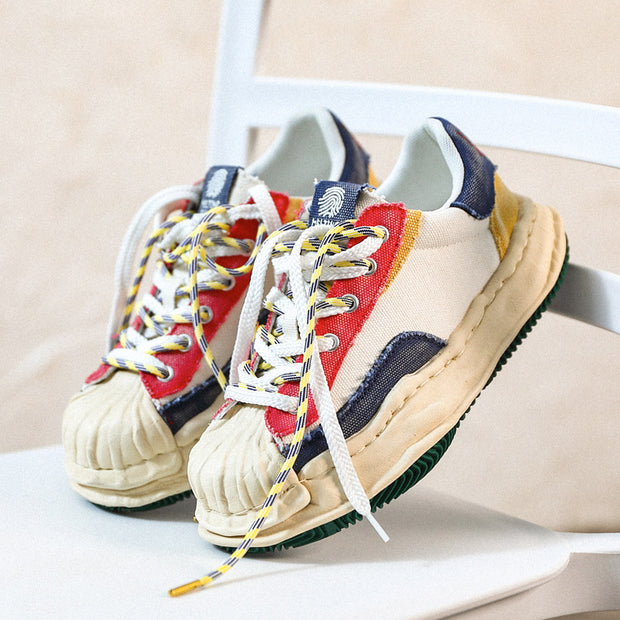 Dissolved shell toe color block shoes