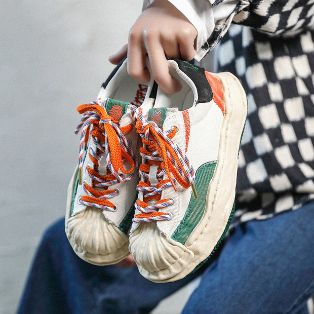Dissolved shell toe color block shoes