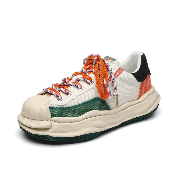 Dissolved shell toe color block shoes