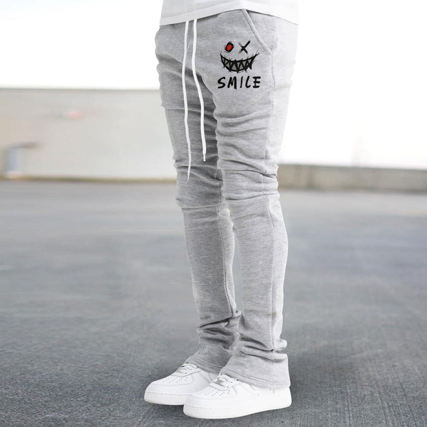 Retro street print flared slim-fit trousers