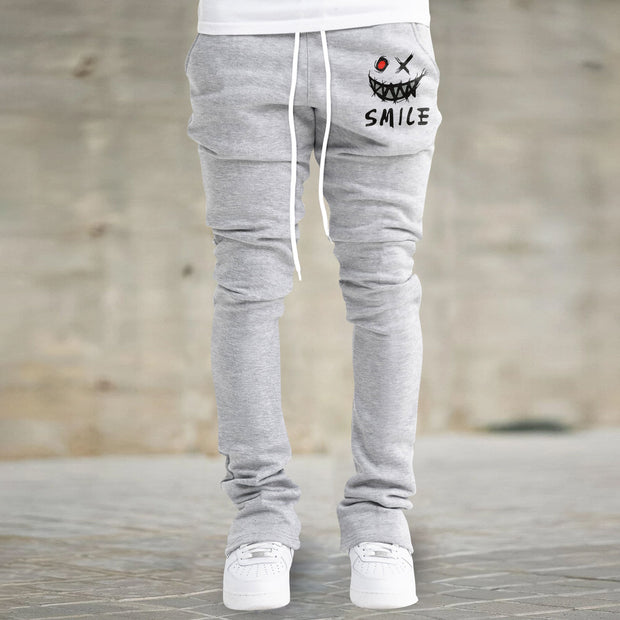 Retro street print flared slim-fit trousers